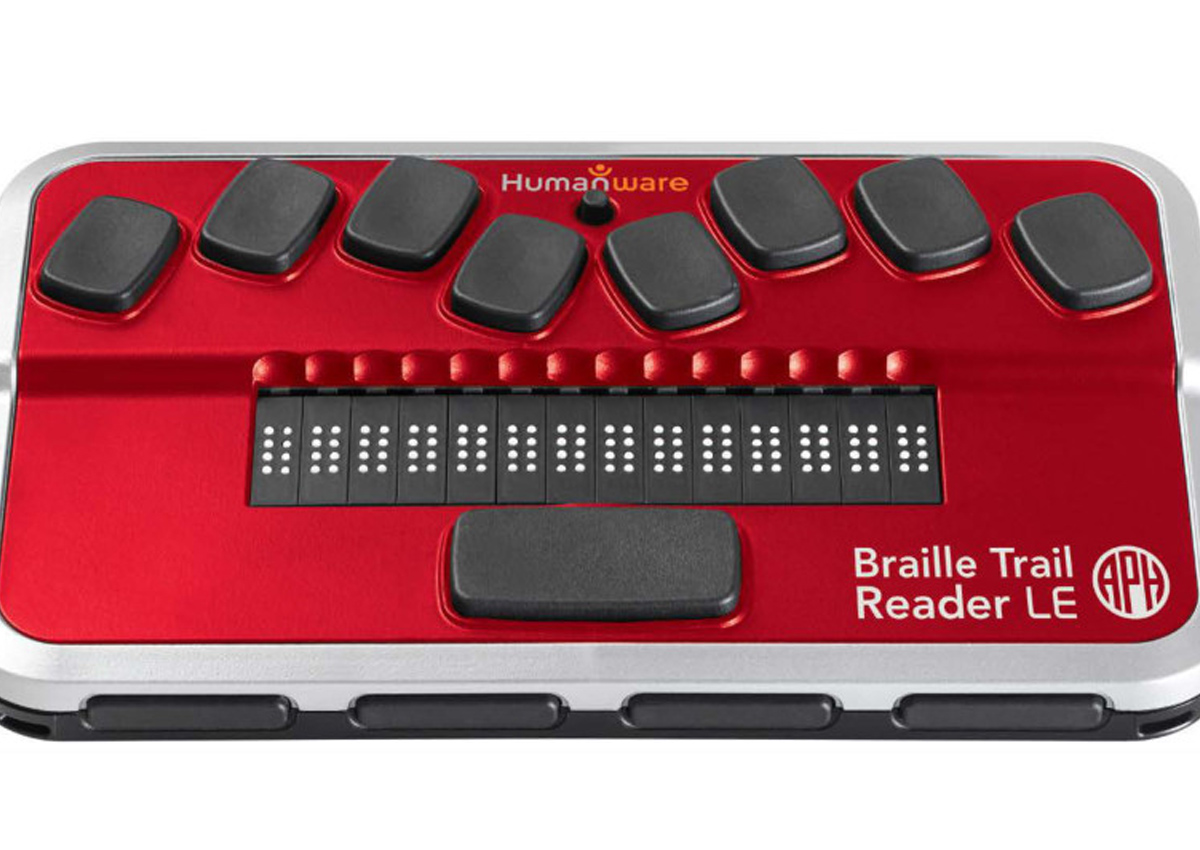 Image of a Braille Tail Reader LE. It is red and has standard buttons.