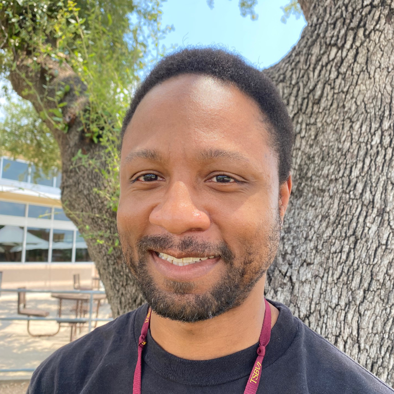 Image of Brent in front of tree