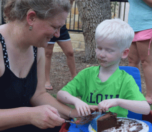 picture of boy eating cake