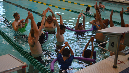 Students doing water aerobics at Camp Abilities