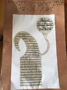 A picture of the author’s name in braille with poem written in the drawing of a cochlear implant.